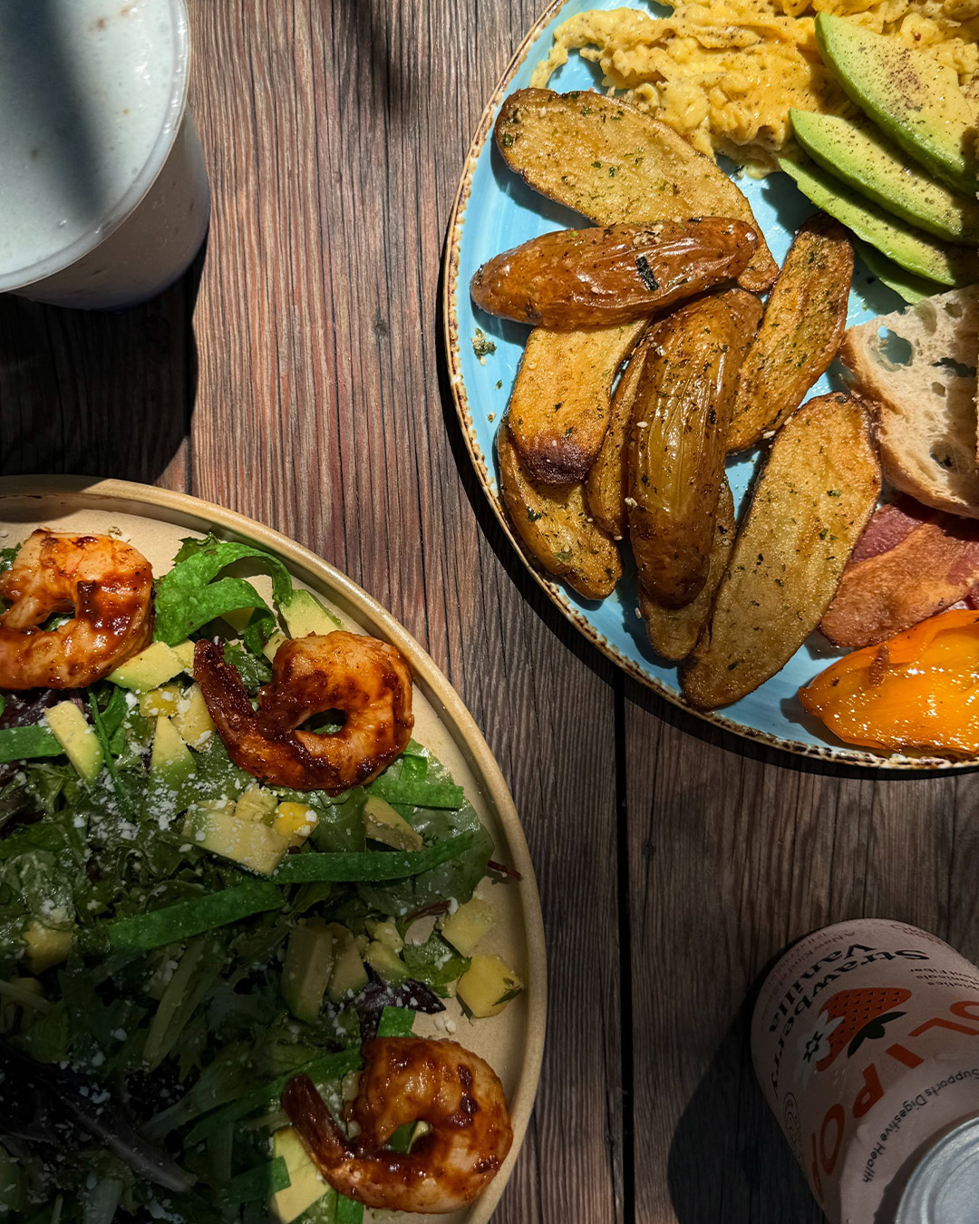 Breakfast plate with fingerling potatoes, eggs and avocado